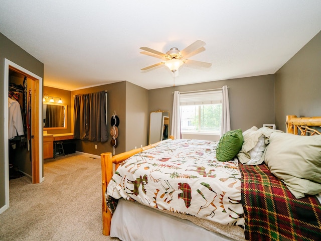 519 Graceview Loop, Saint Joseph, MN 56374 - bedroom with light carpet, a ceiling fan, a closet, and a walk in closet