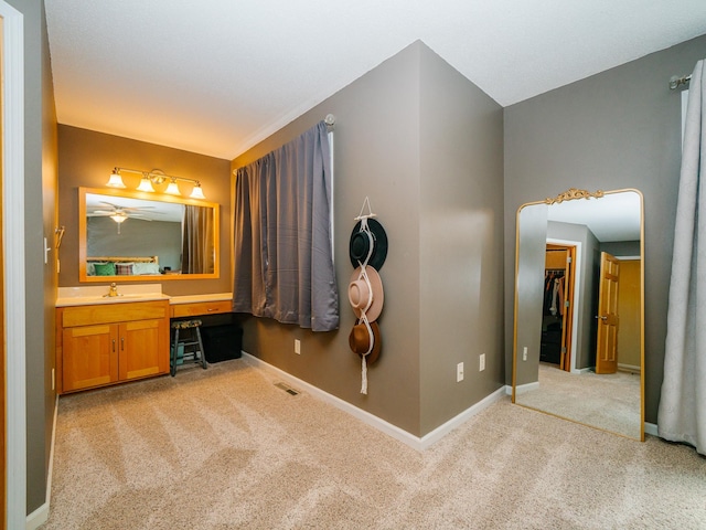 519 Graceview Loop, Saint Joseph, MN 56374 - bathroom featuring carpet flooring, vanity, and ceiling fan