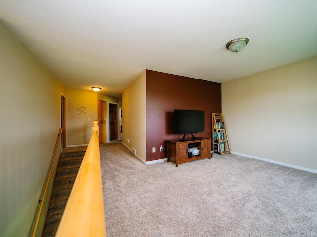 519 Graceview Loop, Saint Joseph, MN 56374 - carpeted living area with baseboards and stairway