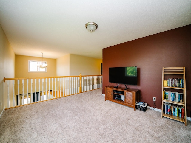 519 Graceview Loop, Saint Joseph, MN 56374 - carpeted living room featuring a chandelier and baseboards