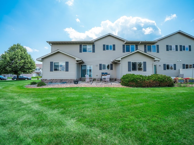 519 Graceview Loop, Saint Joseph, MN 56374 - back of property with a patio and a yard