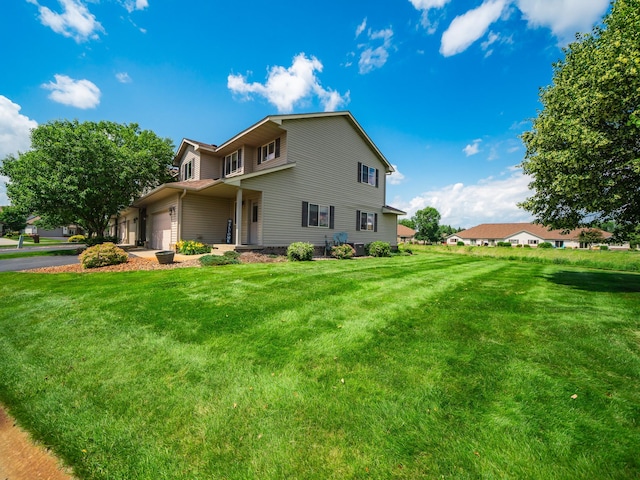 519 Graceview Loop, Saint Joseph, MN 56374 - view of front of house featuring a front lawn and driveway