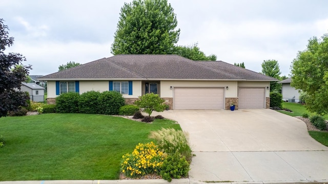 1100 27th St SW, Austin, MN 55912 - ranch-style home with an attached garage, a front yard, and concrete driveway