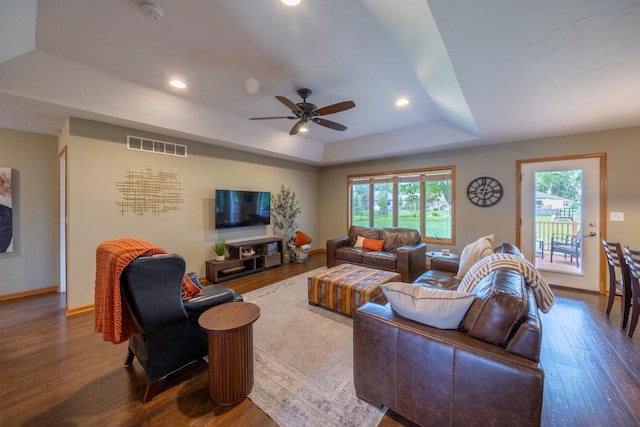 1100 27th St SW, Austin, MN 55912 - living area with a tray ceiling, wood finished floors, healthy amount of natural light, ceiling fan, and recessed lighting