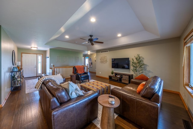 1100 27th St SW, Austin, MN 55912 - living room featuring a tray ceiling, wood finished floors, ceiling fan, and recessed lighting