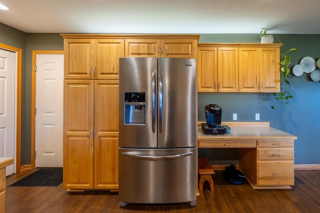 1100 27th St SW, Austin, MN 55912 - kitchen featuring stainless steel fridge, built in desk, dark wood-type flooring, and light countertops