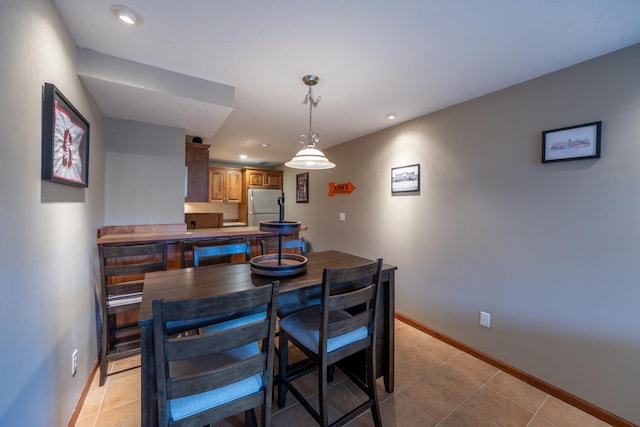 1100 27th St SW, Austin, MN 55912 - dining room featuring light tile patterned floors and recessed lighting