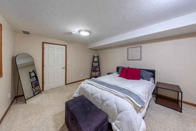 1100 27th St SW, Austin, MN 55912 - bedroom with carpet floors and a textured ceiling