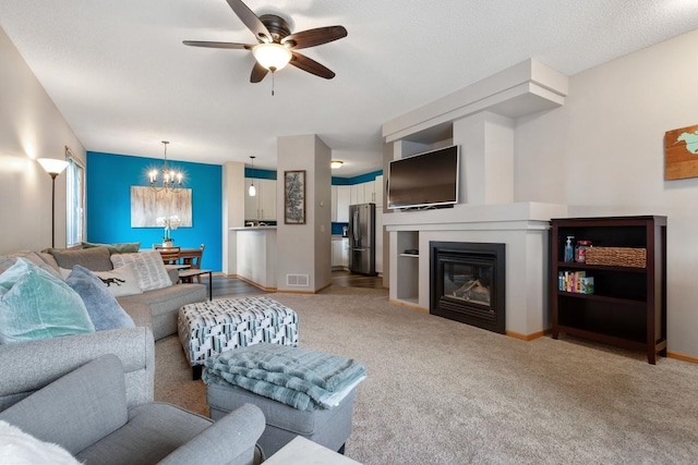 3214 Juniper Cir Unit C, Woodbury, MN 55125 - living area with a ceiling fan, a chandelier, light carpet, and a glass covered fireplace