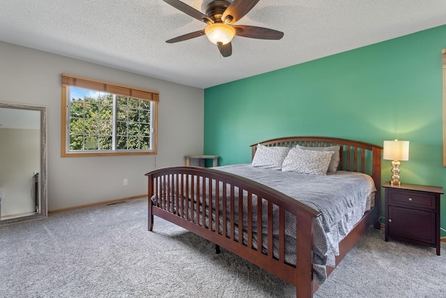 3214 Juniper Cir Unit C, Woodbury, MN 55125 - carpeted bedroom featuring a textured ceiling and a ceiling fan