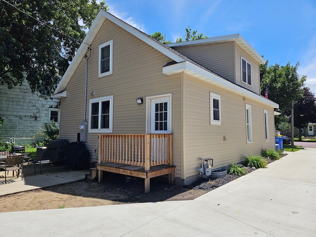 411 Main St, Pipestone, MN 56164 - back of property featuring a patio