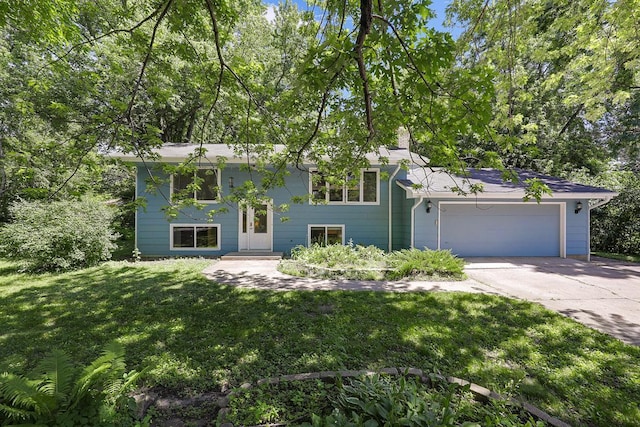 801 Corens Dr, Minnetonka, MN 55305 - view of front of house with driveway, a front lawn, and a garage
