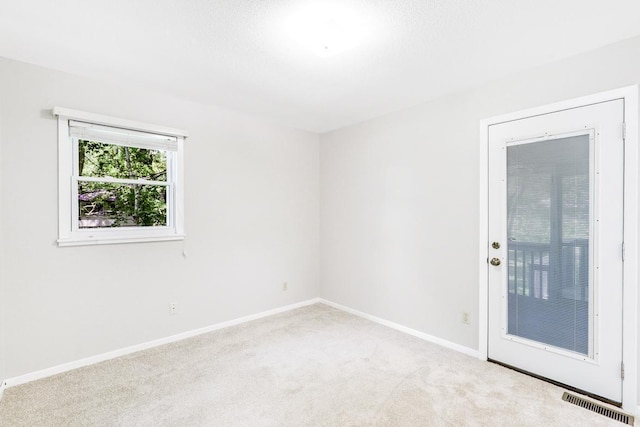 801 Corens Dr, Minnetonka, MN 55305 - carpeted spare room with baseboards