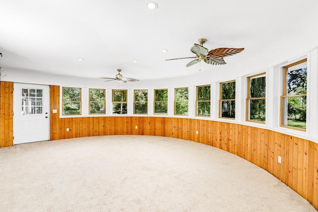 801 Corens Dr, Minnetonka, MN 55305 - unfurnished sunroom featuring wood walls, carpet flooring, and recessed lighting