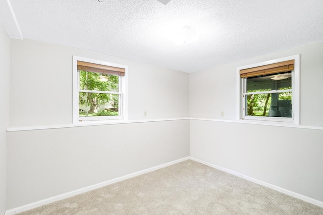 801 Corens Dr, Minnetonka, MN 55305 - unfurnished room with carpet flooring and a textured ceiling