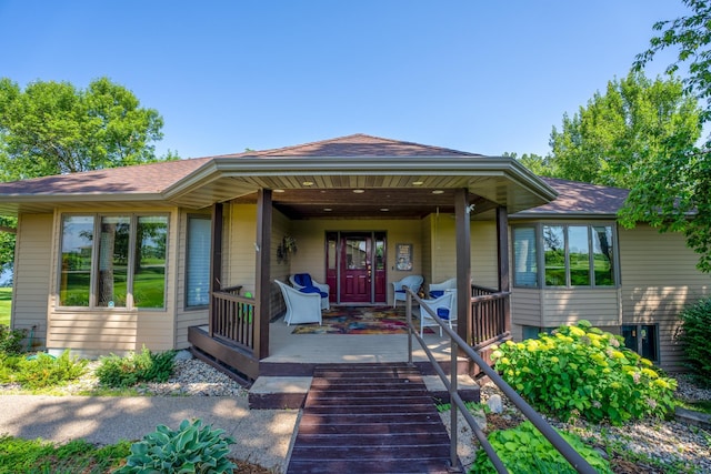 870 Andrew Dr NE, Lake Andrew Twp, MN 56273 - view of front of house with covered porch and a shingled roof