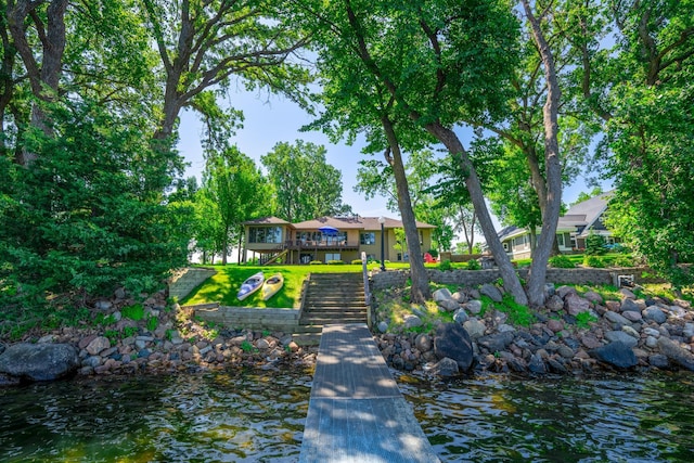 870 Andrew Dr NE, Lake Andrew Twp, MN 56273 - dock area featuring a deck with water view and stairway