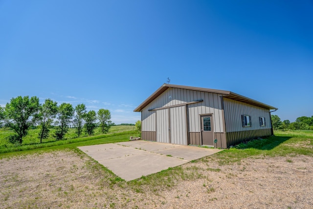 870 Andrew Dr NE, Lake Andrew Twp, MN 56273 - view of pole building with driveway