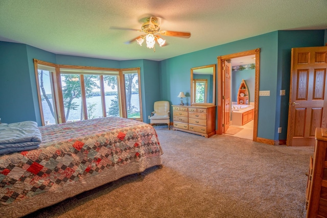 870 Andrew Dr NE, Lake Andrew Twp, MN 56273 - bedroom with a textured ceiling, carpet floors, a ceiling fan, a water view, and ensuite bath