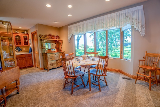 870 Andrew Dr NE, Lake Andrew Twp, MN 56273 - dining space featuring light carpet and recessed lighting