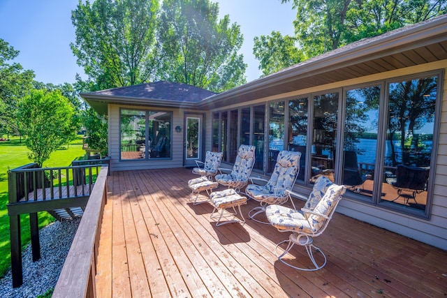 870 Andrew Dr NE, Lake Andrew Twp, MN 56273 - wooden deck with a water view