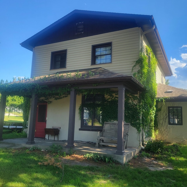 301 Kirkwood St E, Lanesboro, MN 55949 - rear view of property featuring a porch