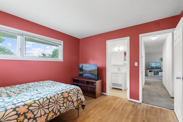 1620 7th St NW, New Brighton, MN 55112 - bedroom with light wood finished floors and baseboards