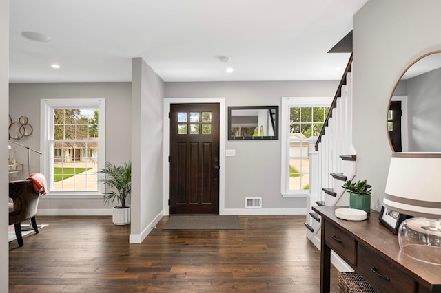 6712 Hillside Ln, Edina, MN 55439 - entryway featuring dark wood finished floors, stairway, healthy amount of natural light, and recessed lighting