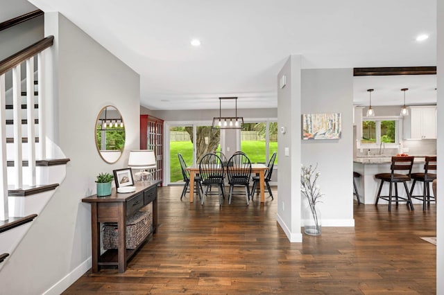 6712 Hillside Ln, Edina, MN 55439 - corridor with dark wood finished floors and recessed lighting