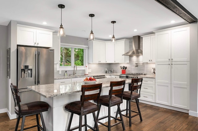 6712 Hillside Ln, Edina, MN 55439 - kitchen featuring wall chimney exhaust hood, stainless steel refrigerator with ice dispenser, dark wood-style floors, tasteful backsplash, and recessed lighting