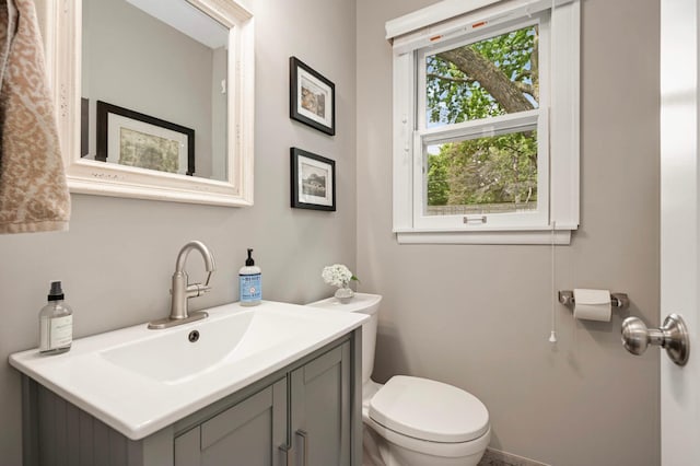 6712 Hillside Ln, Edina, MN 55439 - bathroom featuring toilet and vanity