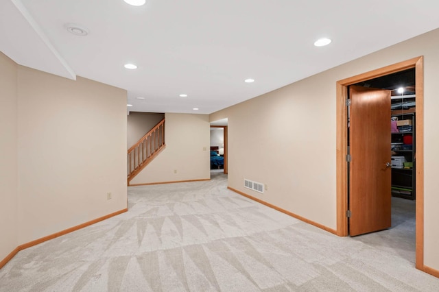 6712 Hillside Ln, Edina, MN 55439 - empty room featuring carpet floors, stairway, and recessed lighting