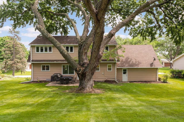 6712 Hillside Ln, Edina, MN 55439 - rear view of house with a patio area and a lawn