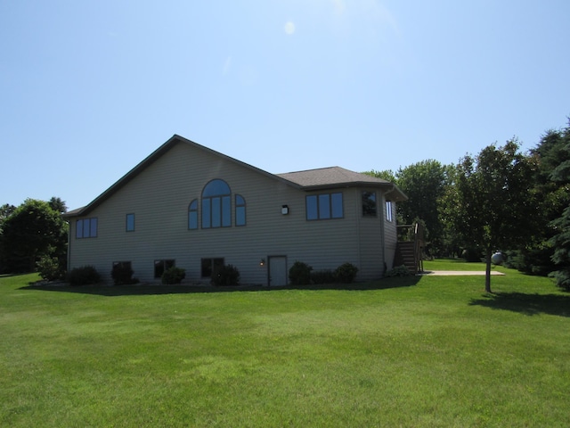 316 8th St NE, Fulda, MN 56131 - view of side of property featuring a yard and stairway