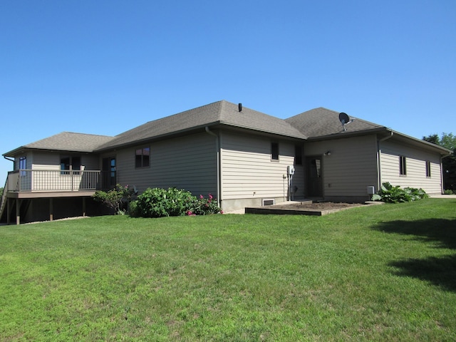 316 8th St NE, Fulda, MN 56131 - back of property featuring a lawn and a deck