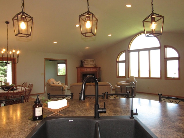 316 8th St NE, Fulda, MN 56131 - kitchen with a chandelier, recessed lighting, vaulted ceiling, hanging light fixtures, and open floor plan