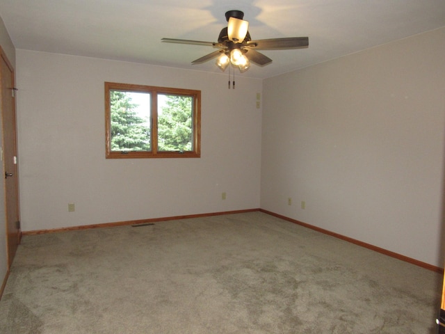 316 8th St NE, Fulda, MN 56131 - unfurnished room with light colored carpet and ceiling fan