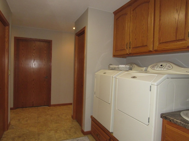 316 8th St NE, Fulda, MN 56131 - washroom featuring separate washer and dryer and cabinet space