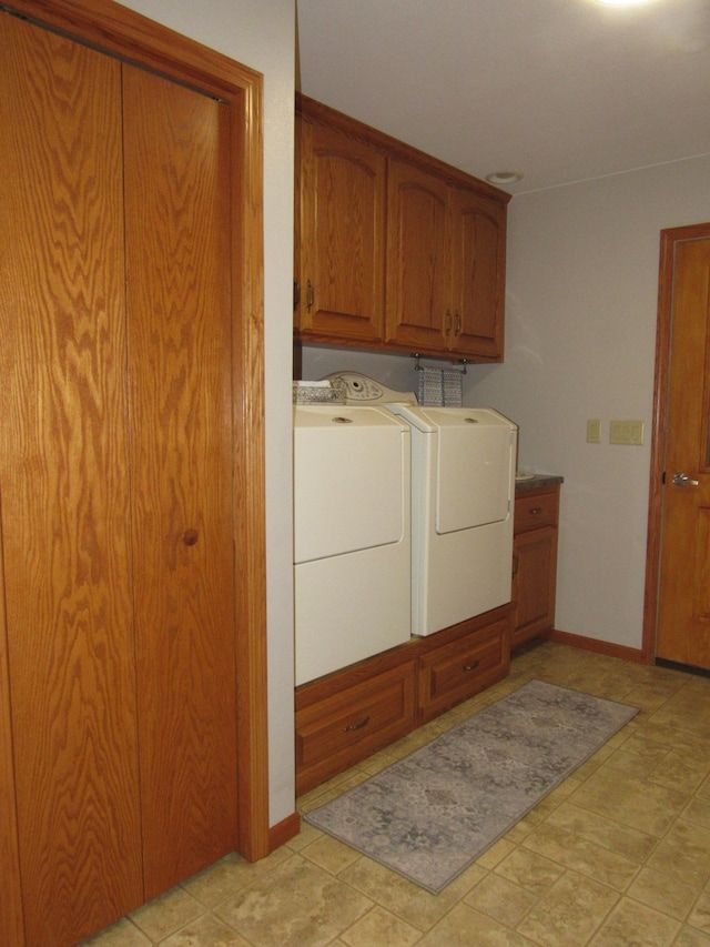 316 8th St NE, Fulda, MN 56131 - laundry area featuring washing machine and clothes dryer and cabinet space