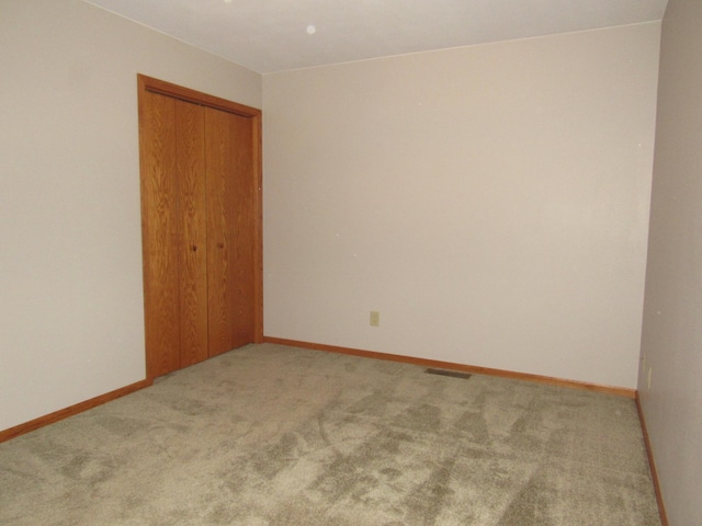 316 8th St NE, Fulda, MN 56131 - carpeted spare room with baseboards