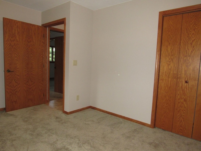 316 8th St NE, Fulda, MN 56131 - unfurnished bedroom featuring carpet and baseboards