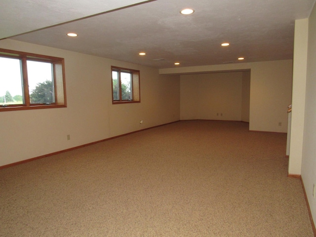 316 8th St NE, Fulda, MN 56131 - empty room featuring light carpet and recessed lighting