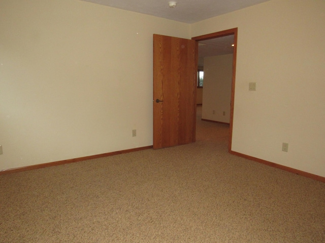 316 8th St NE, Fulda, MN 56131 - spare room featuring carpet