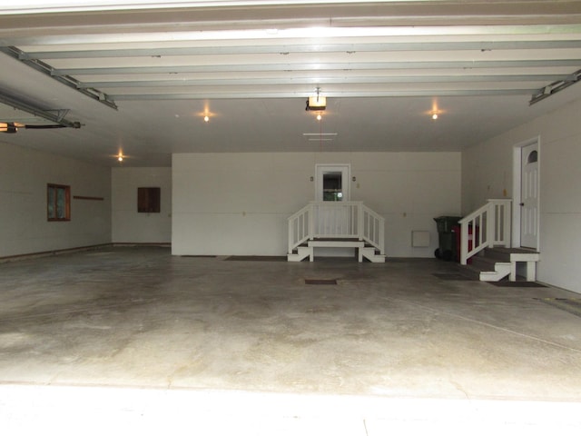 316 8th St NE, Fulda, MN 56131 - garage featuring a garage door opener