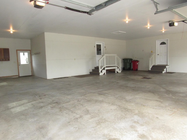 316 8th St NE, Fulda, MN 56131 - garage featuring a garage door opener