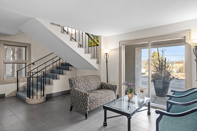 1666 Coffman St Unit 101, Falcon Heights, MN 55108 - living room with stairs and a textured ceiling