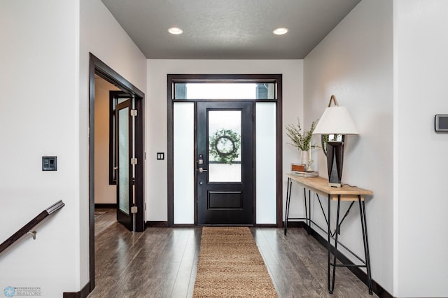 7373 14th St S, Fargo, ND 58104 - entryway with dark wood-style flooring and recessed lighting