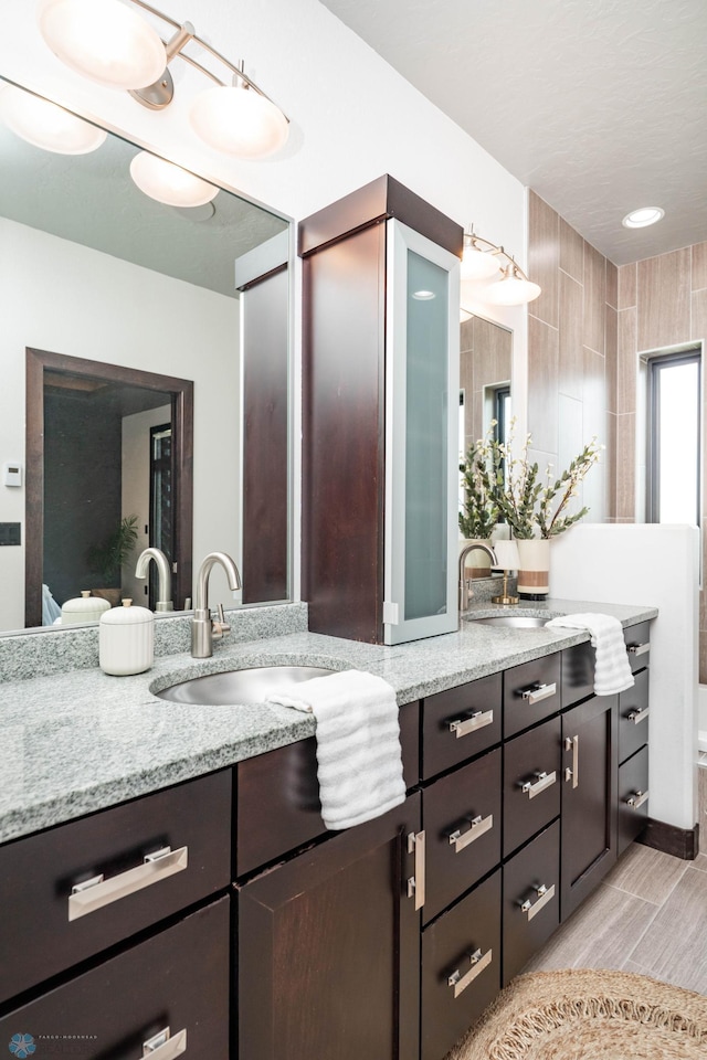 7373 14th St S, Fargo, ND 58104 - bathroom featuring double vanity