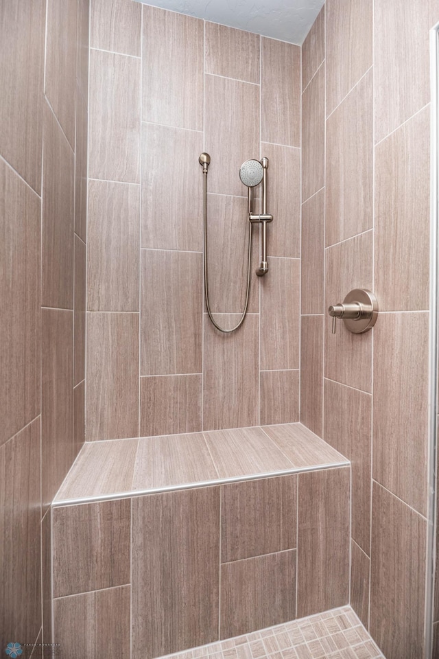 7373 14th St S, Fargo, ND 58104 - full bathroom featuring a tile shower