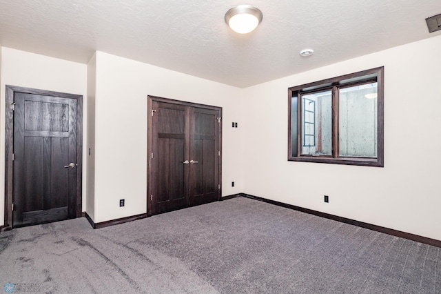 7373 14th St S, Fargo, ND 58104 - unfurnished bedroom with carpet flooring and a closet